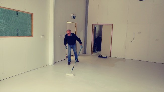 Shed member sealing the newly laid concrete floor inside Block B