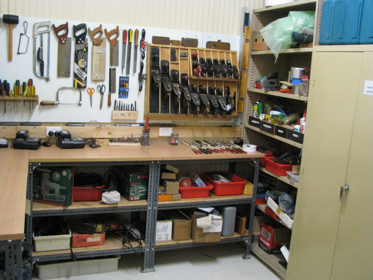 Wall of hand tools neatly hung and labelled in the new workshop